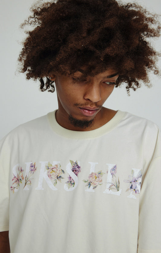 Ecru oversized T-shirt met bloemenprint