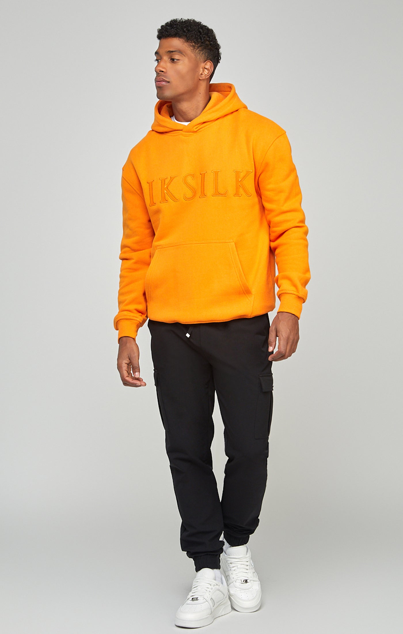 Laad de afbeelding in de Galerij viewer, Oranje relaxed fit sweater met capuchon en appliqué-logo (1)