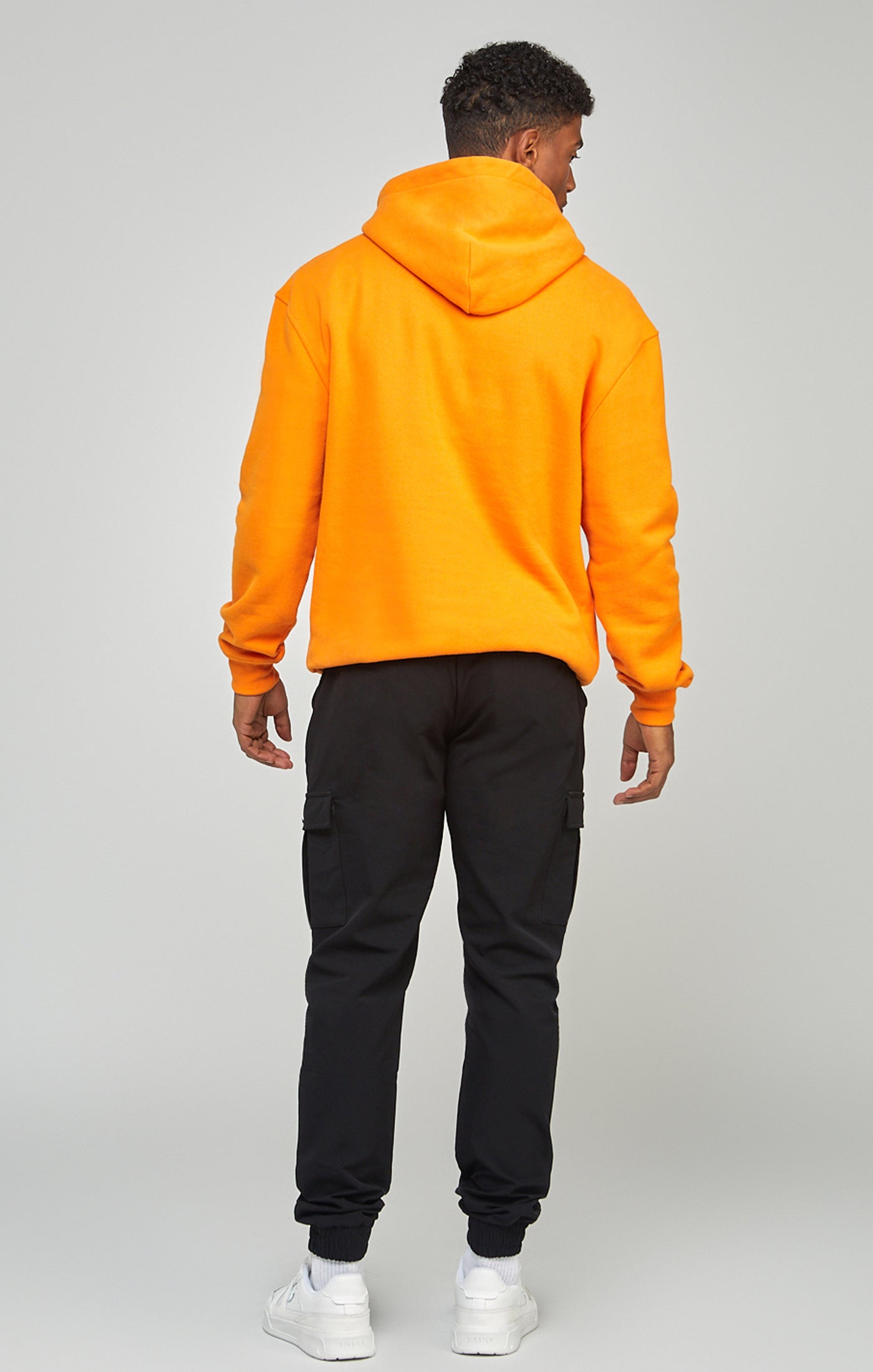 Laad de afbeelding in de Galerij viewer, Oranje relaxed fit sweater met capuchon en appliqué-logo (4)