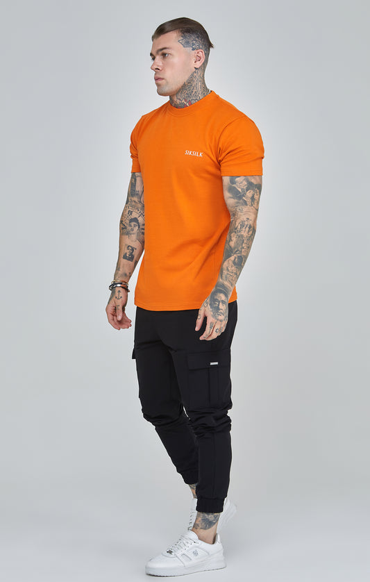 Oranje T-shirt met logo-opdruk en losse pasvorm
